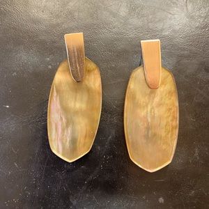 Kendra Scott earrings.